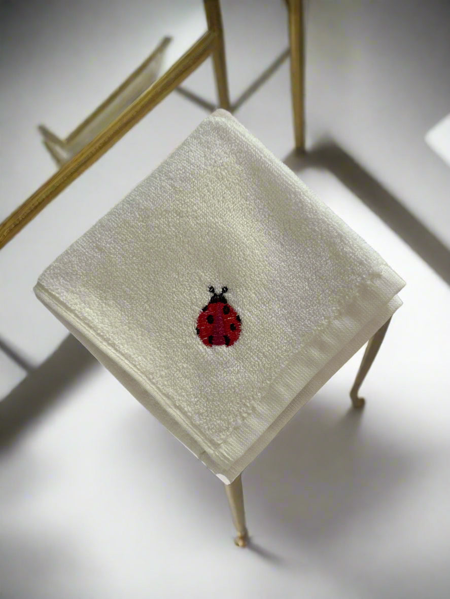 Face Towel with Embroidered Ladbybug π