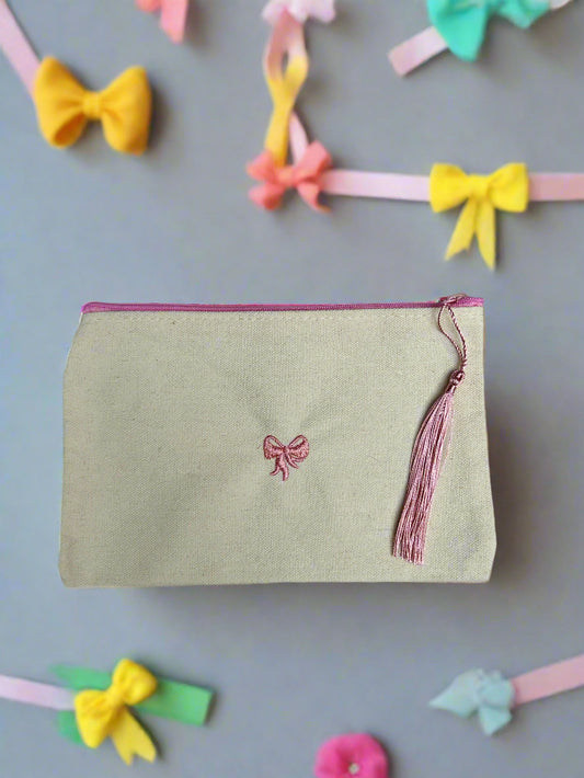 Beige zipper pouch with bow embroidery 🎀
